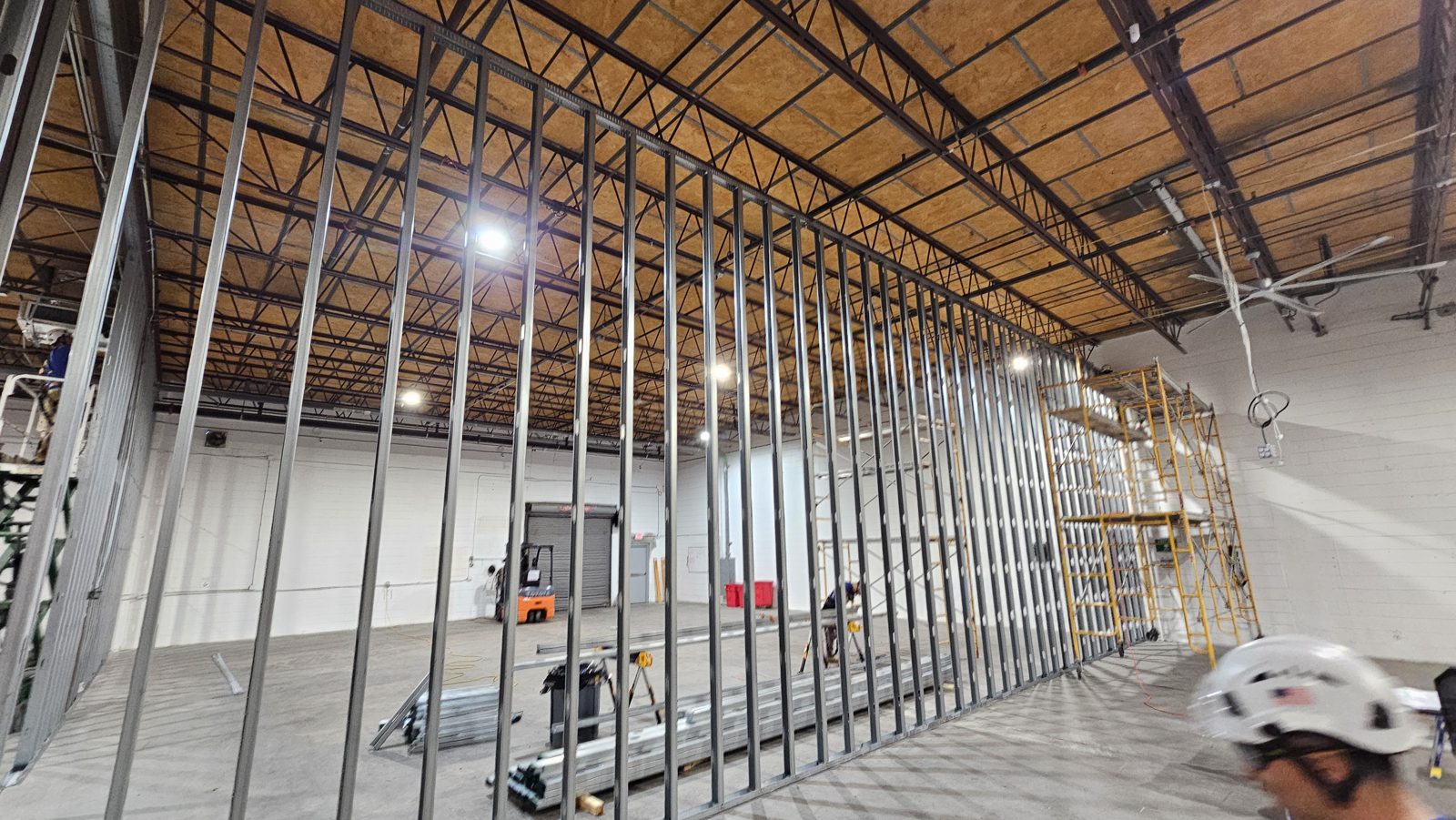 Structural metal stud framing inside a warehouse conversion